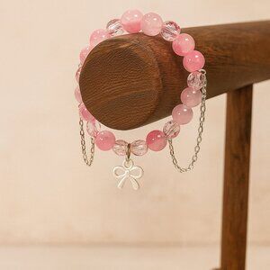 Pink Beaded Bracelet with Silver Bow Charm